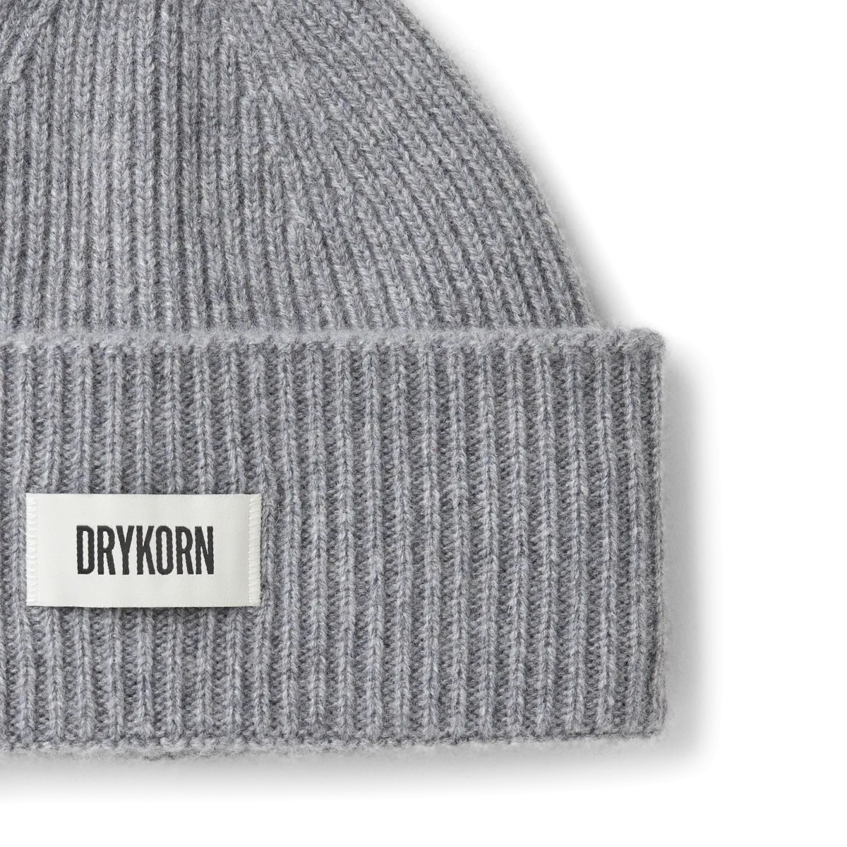 DRYKORN Mütze MOAH in Beige aus 100 % Kaschmir mit breitem Umschlag und Logo-Patch.