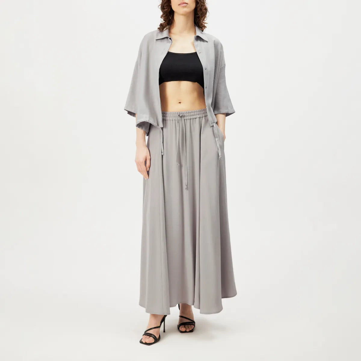 DRYKORN QERIME Tellerrock in knöchellanger Länge mit fließender A-Linie, Mid-Waist-Bund und elegantem Fall aus hochwertigem Modal-Mix.