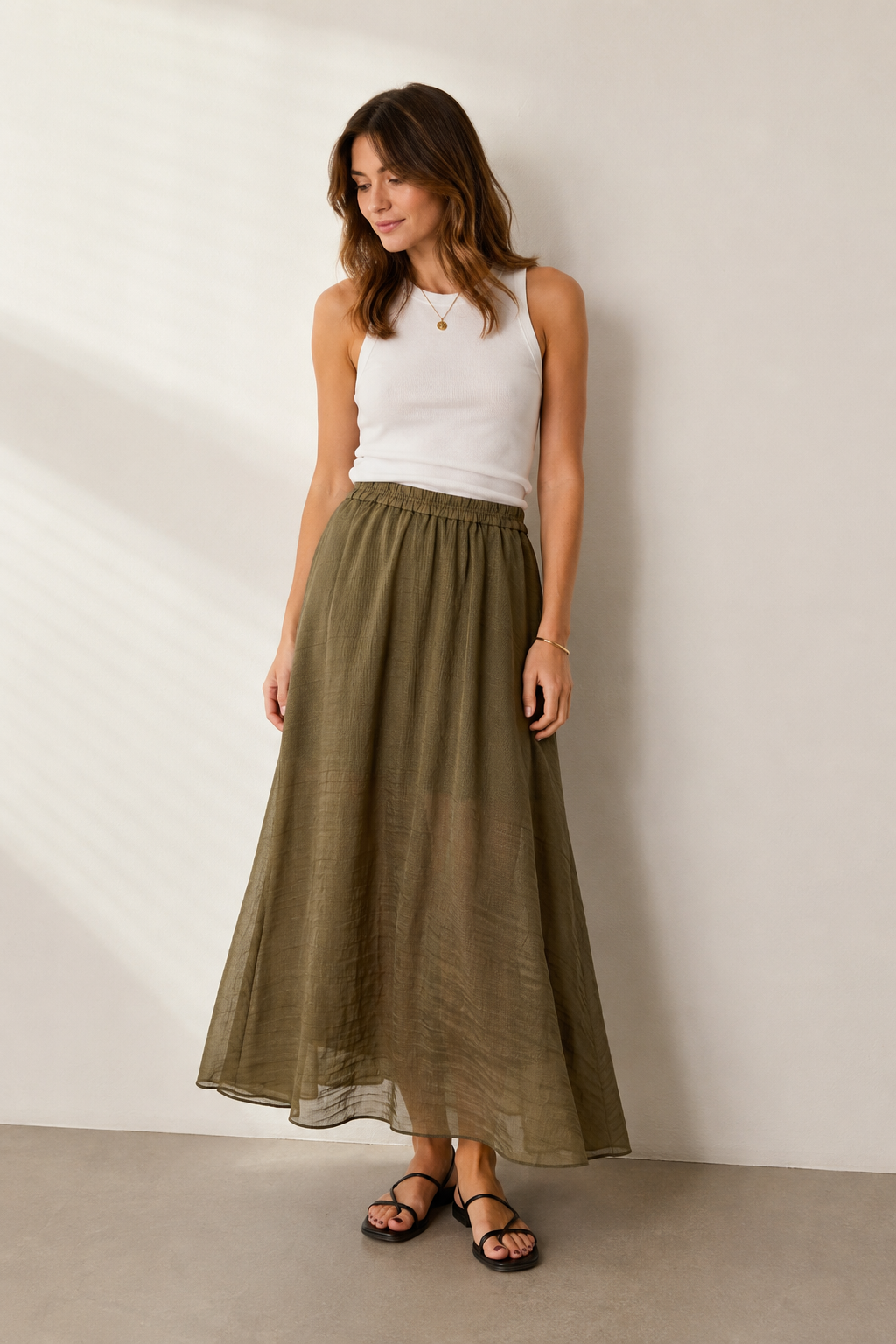 DRYKORN Rock QERIME in Olive luftiger Maxirock mit elastischem Bund und fließender Silhouette aus 100 % recyceltem Polyamid. 